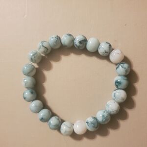 Handmade by my daughter. Elegant turquoise and White Beaded Bracelet